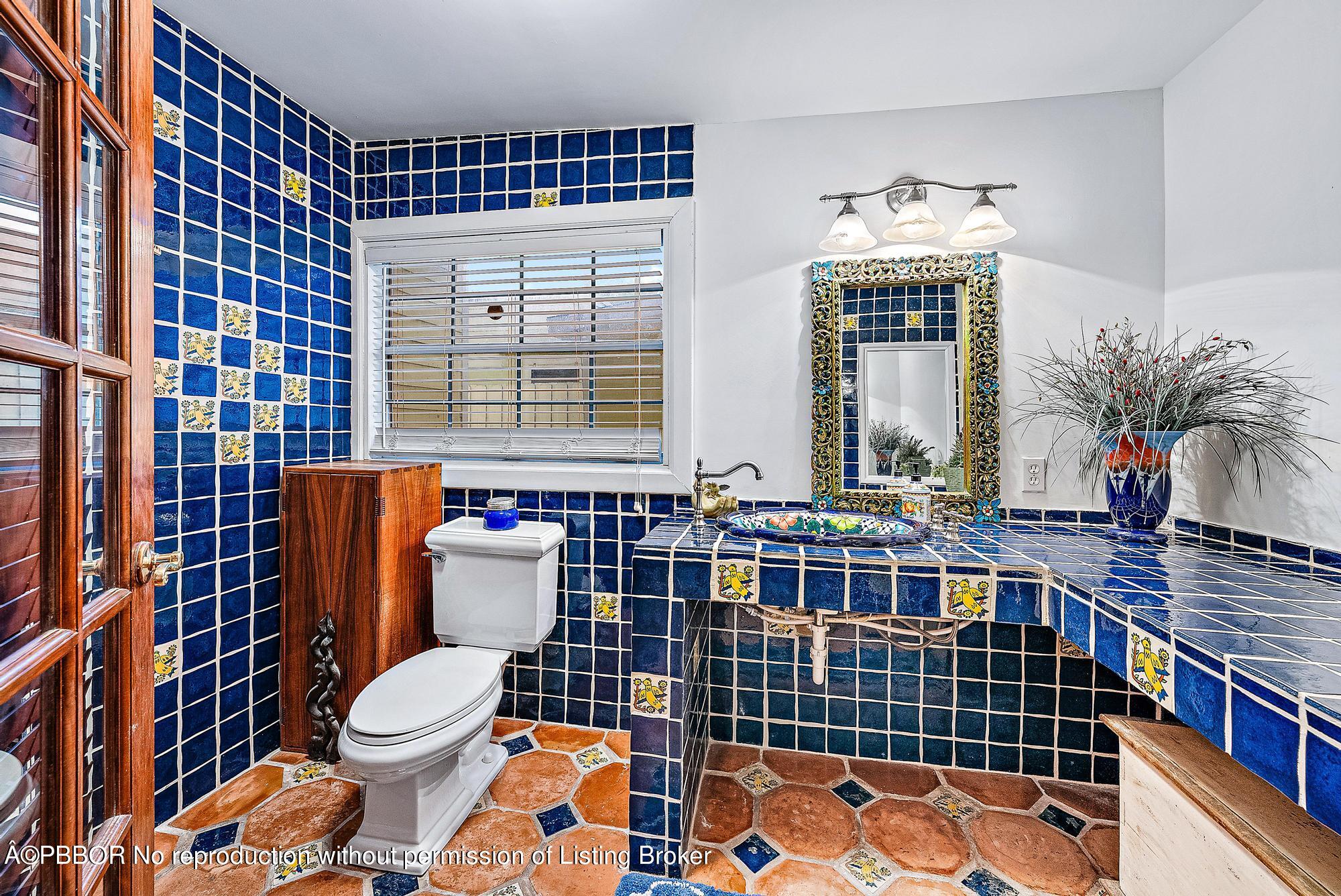 3609 Washington Road West Palm Beach, FL 33405 - Photo 28 of 33 a bathroom with a sink a toilet and shower