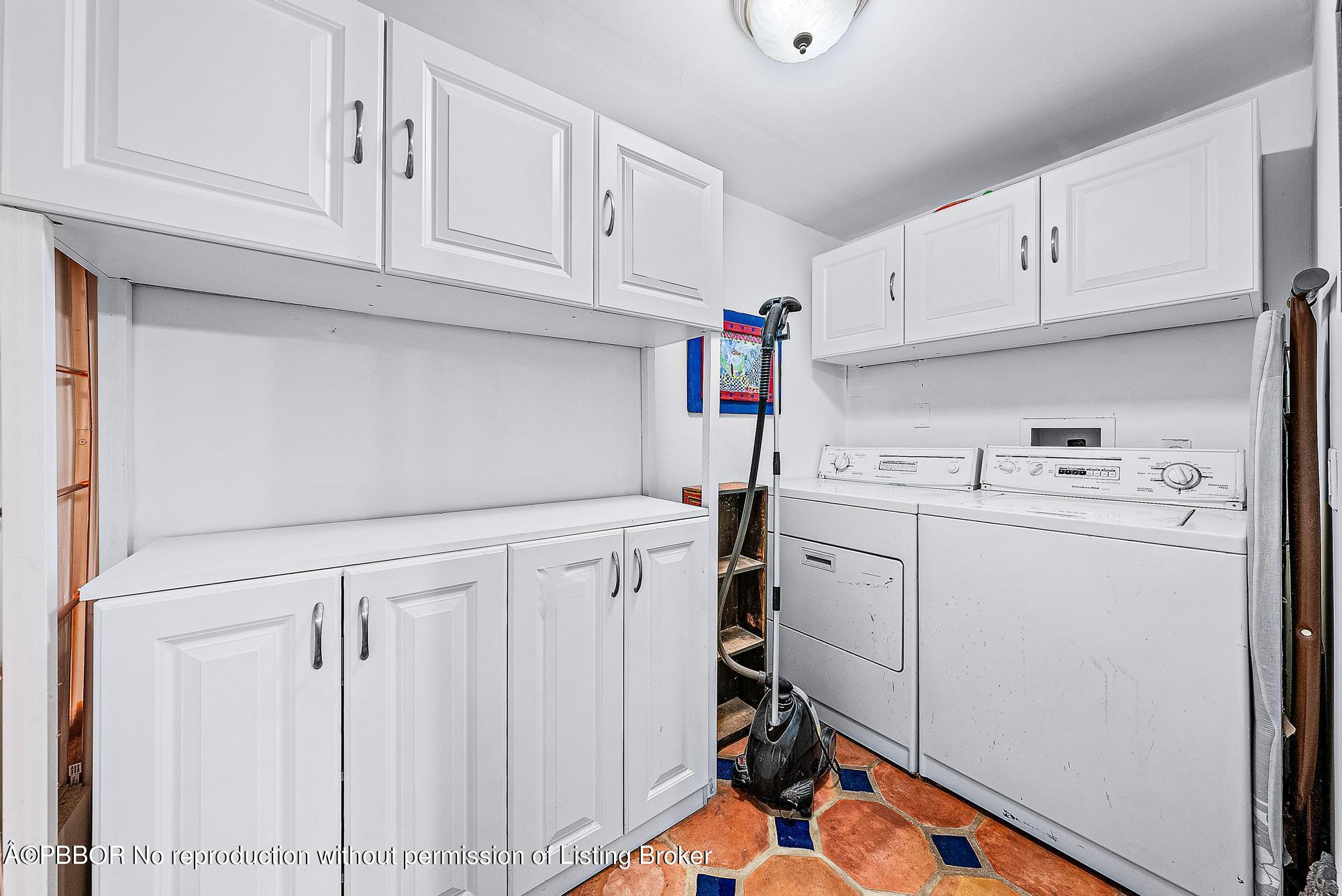 3609 Washington Road West Palm Beach, FL 33405 - Photo 30 of 33 a view of cabinets with wooden floor