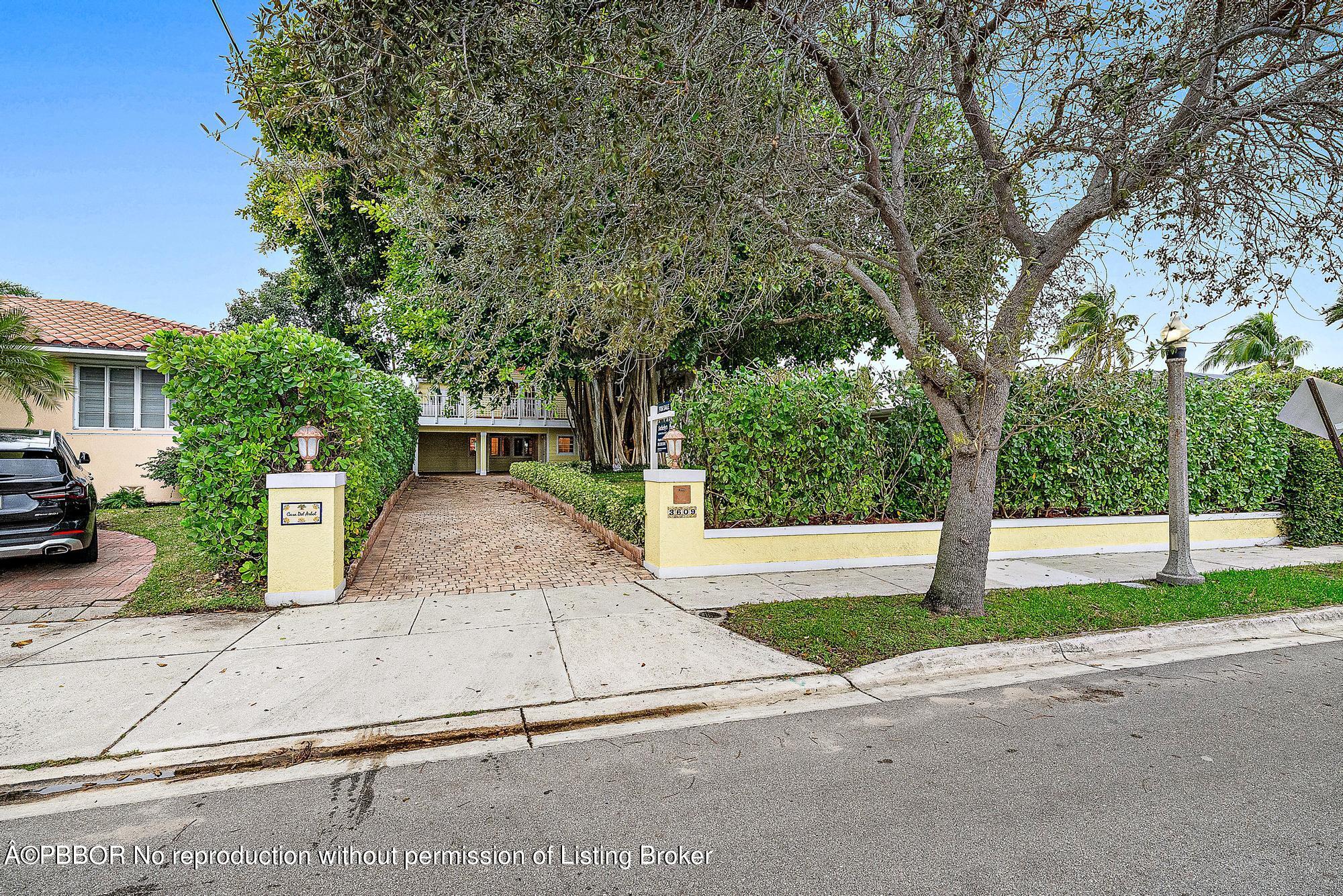 3609 Washington Road West Palm Beach, FL 33405 - Photo 32 of 33 a view of a street with a building and a street sign