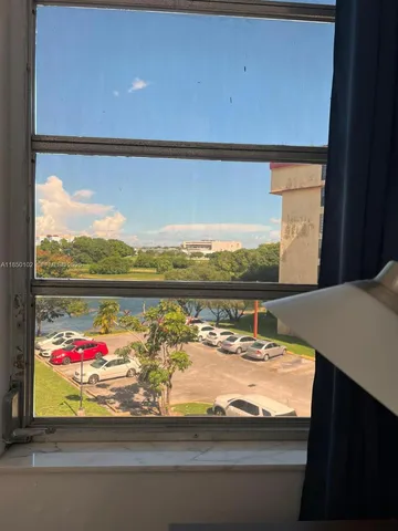 a room with a washing machine and sink