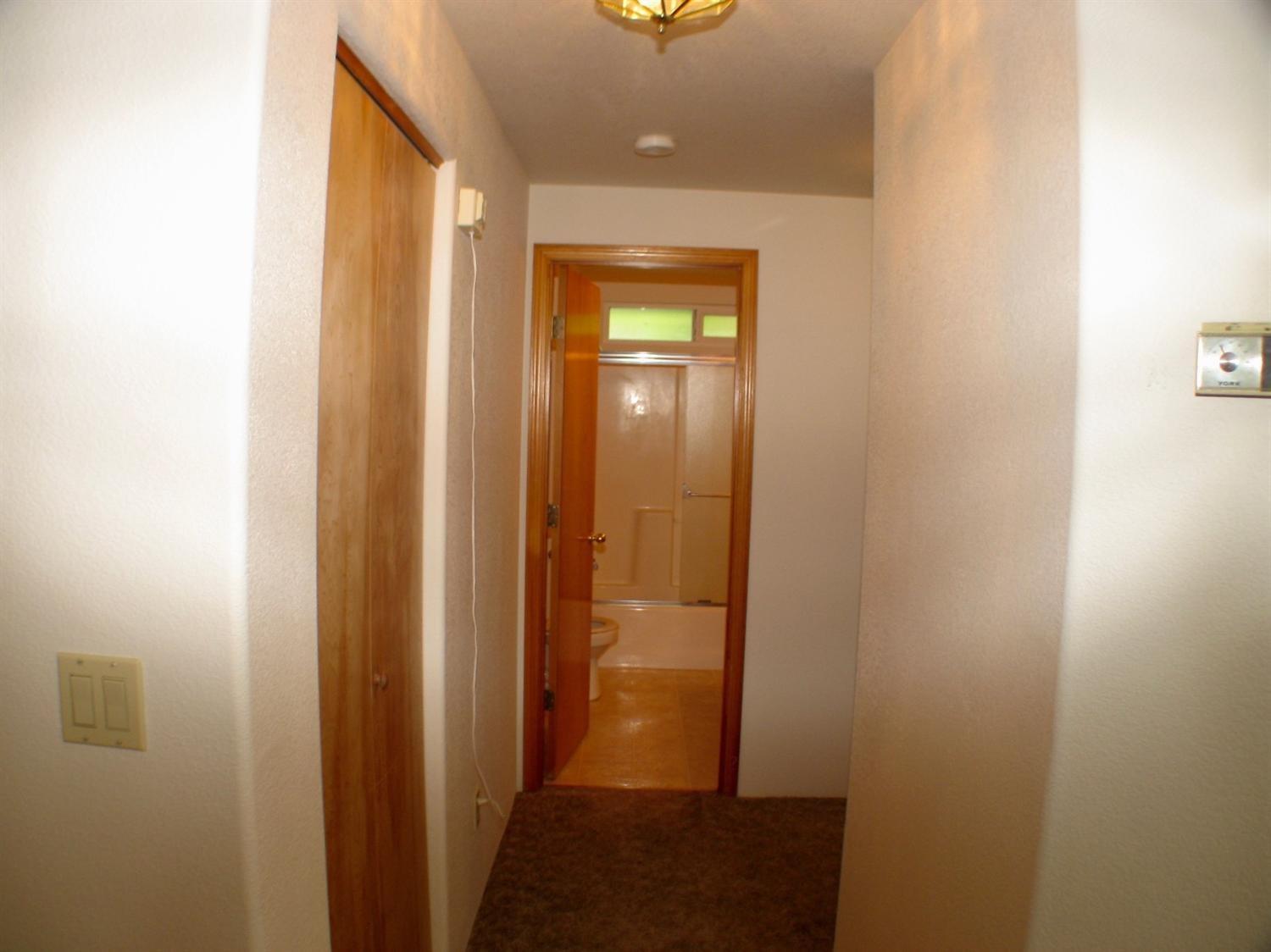 772 Tami Road Grants Pass, OR 97526 - Photo 15 of 33 Hallway to 2nd bathroom and 2nd and 3rd