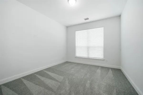 a view of a swimming pool and an outdoor seating