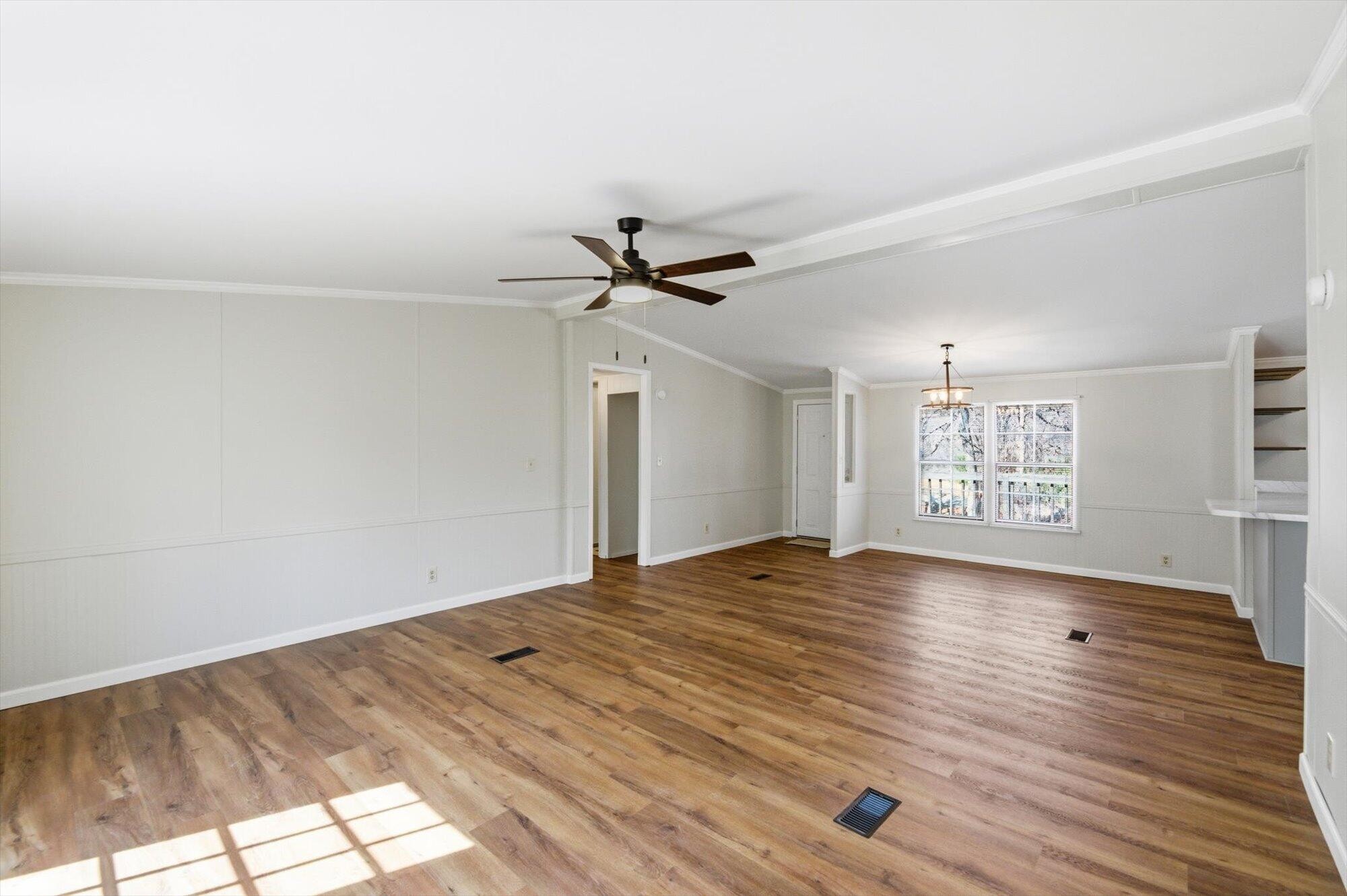 64 County Road 100 Decatur, TN 37322 - Photo 4 of 43 a view of a livingroom with a ceiling fan and window