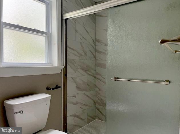 623 3rd Street Delanco, NJ 08075 - Photo 26 of 44 a bathroom with a toilet and a shower
