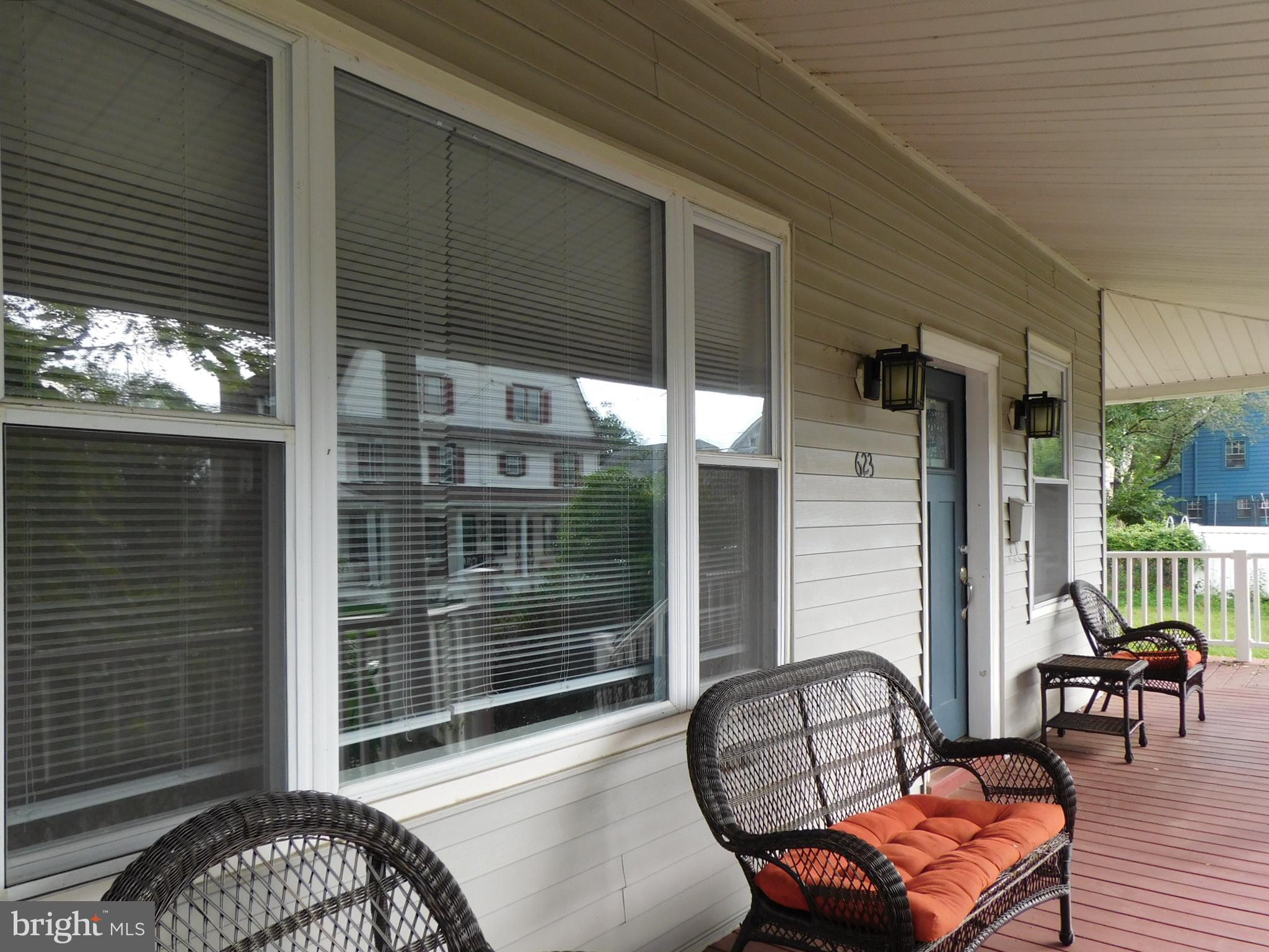 623 3rd Street Delanco, NJ 08075 - Photo 3 of 44 a outdoor living space with patio furniture and a potted plant