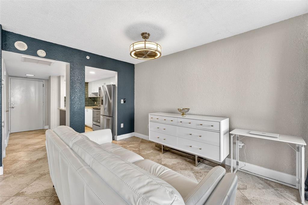 470 3rd Street South, Unit 318 St. Petersburg, FL 33701 - Photo 22 of 45 a room with a bed and ceiling fan