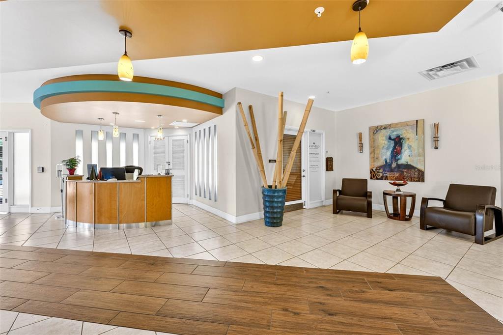 470 3rd Street South, Unit 318 St. Petersburg, FL 33701 - Photo 7 of 45 a living room with furniture and a wooden floor