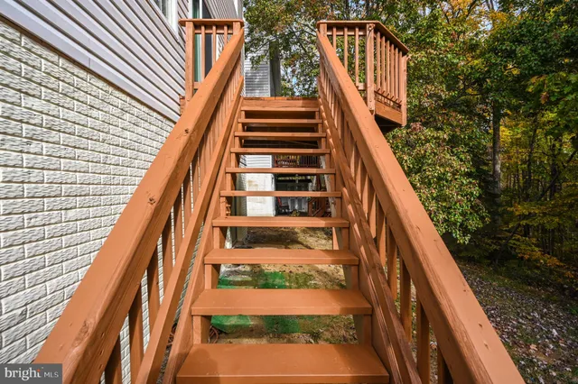 a view of balcony with wooden floor