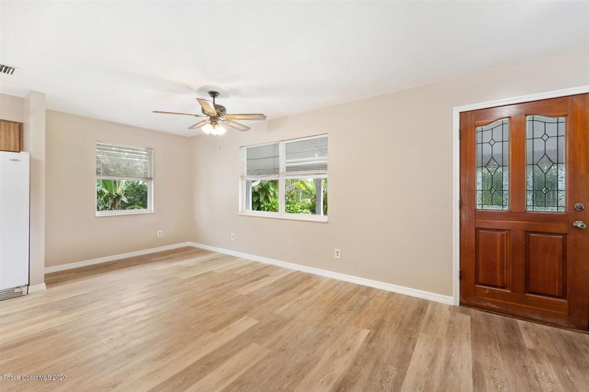 3600 Leghorn Road Grant Valkaria, FL 32950 - Photo 10 of 33 an empty room with windows and closet