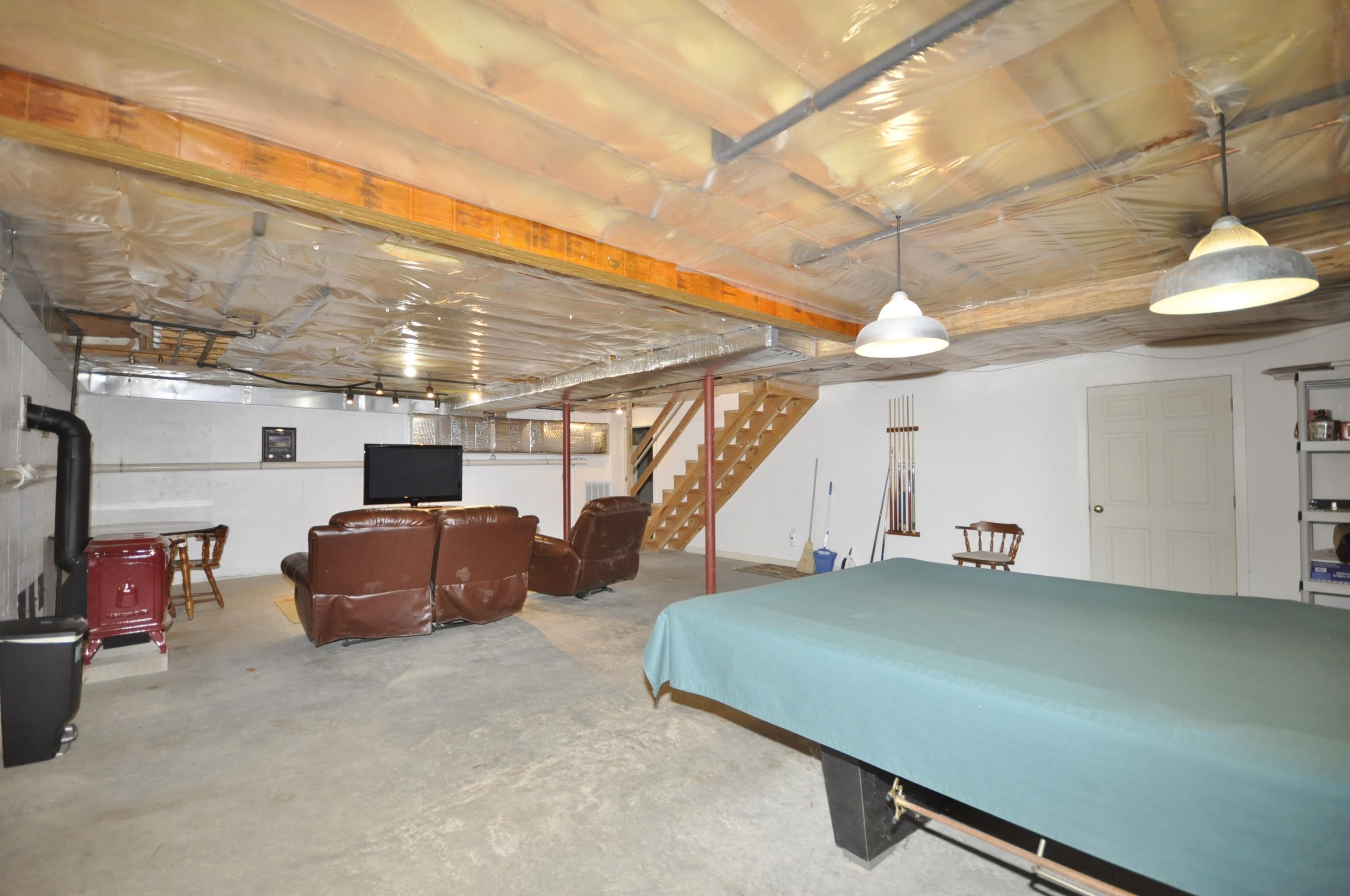 24 Pilgrim Road Sagamore Beach, MA 02562 - Photo 33 of 37 a view of a room with gym equipment