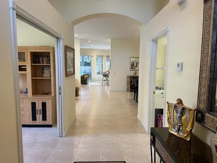a view of a livingroom with furniture and front door