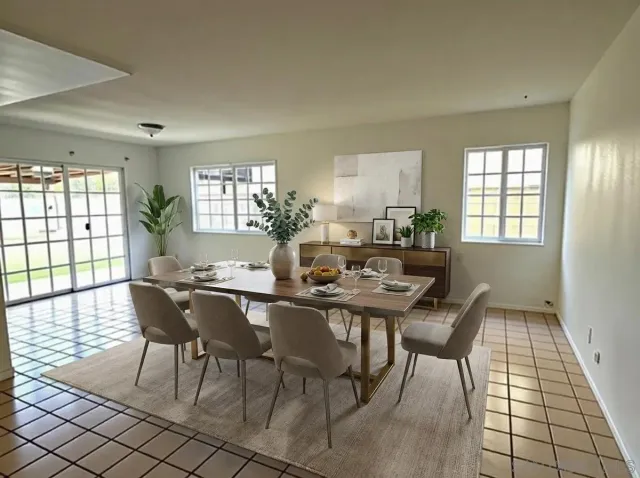 a view of a dining room with furniture