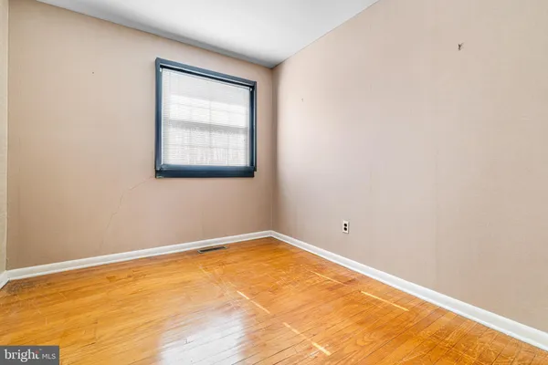 a view of an empty room with window