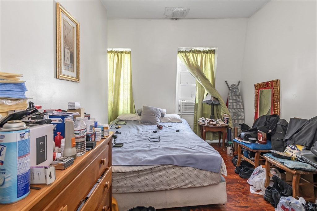 191 Farnham Street Lawrence, MA 01843 - Photo 26 of 31 a bedroom with bed and a window