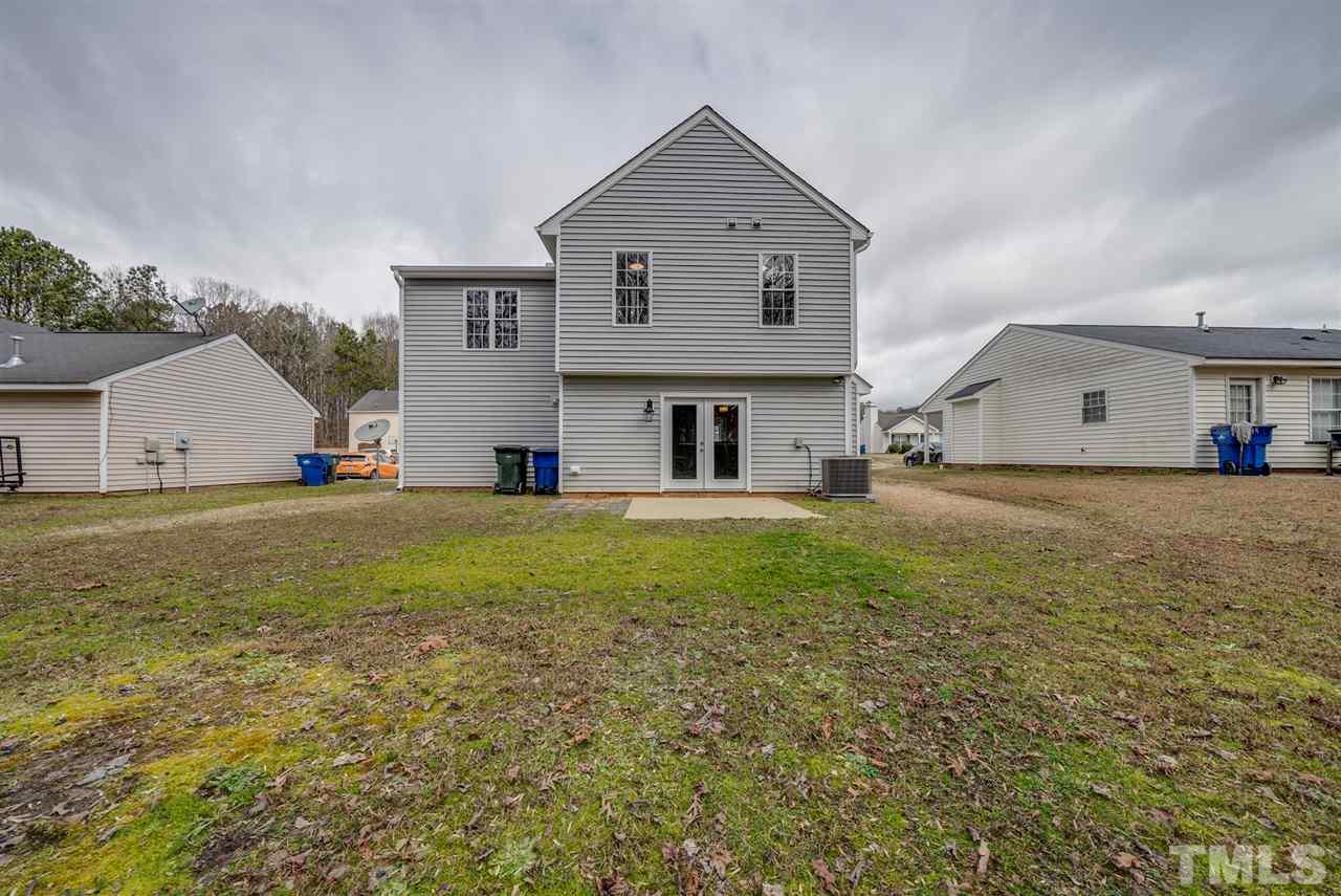 5408 Gunnette Drive Raleigh, NC 27610 - Photo 22 of 23 a house view with a garden space