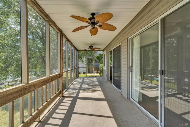 a view of a porch with wooden floor