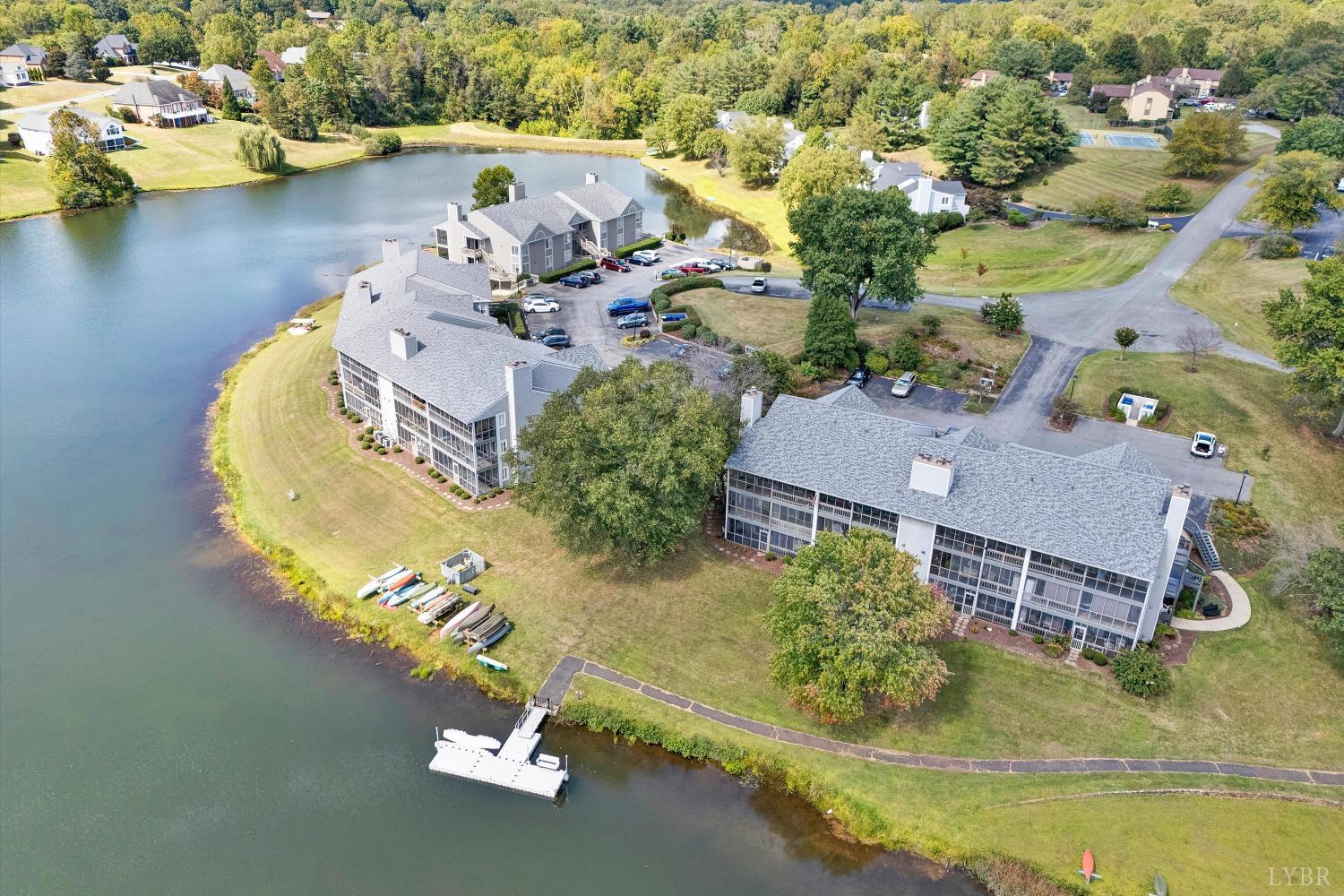 3114 Spinnaker Point Forest, VA 24551 - Photo 2 of 47 an aerial view of a house with swimming pool and ocean view