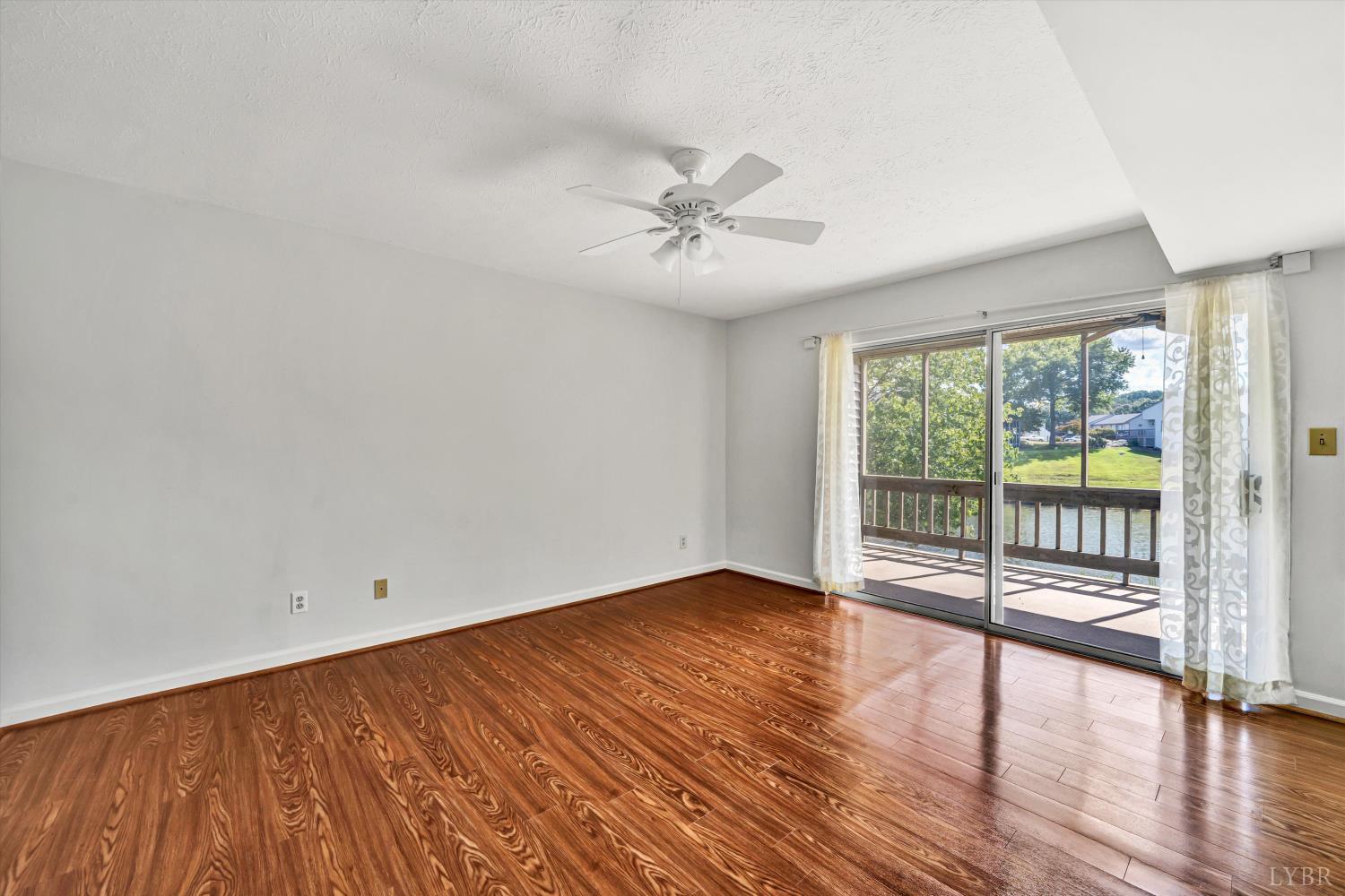 3114 Spinnaker Point Forest, VA 24551 - Photo 21 of 47 wooden floor in an empty room with a window