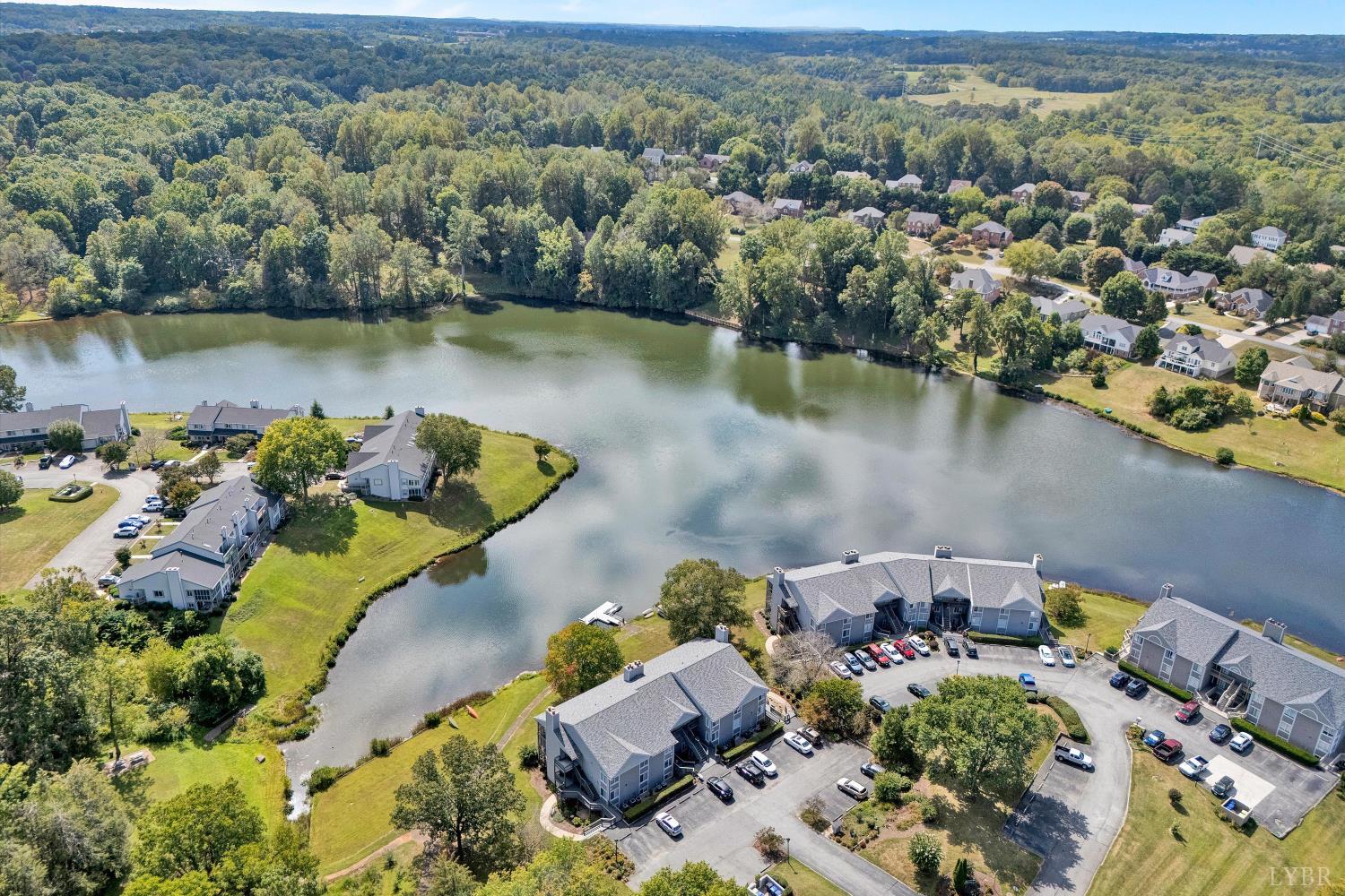 3114 Spinnaker Point Forest, VA 24551 - Photo 3 of 47 an aerial view of a house with a lake view
