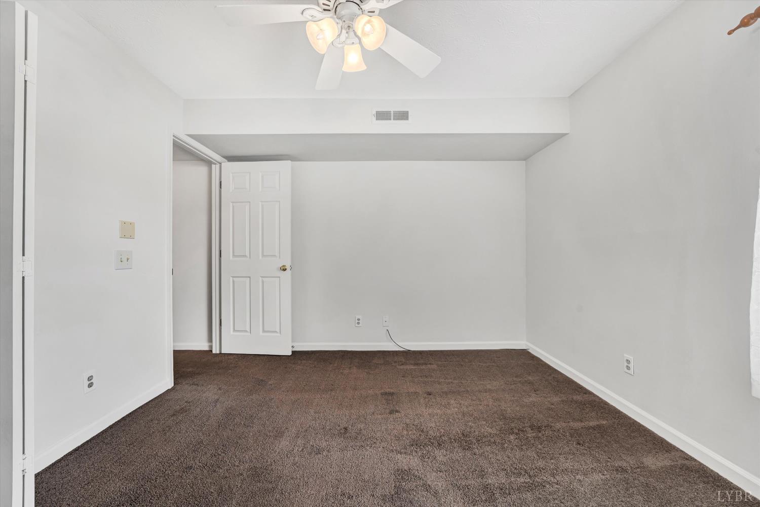 3114 Spinnaker Point Forest, VA 24551 - Photo 31 of 47 an empty room with a chandelier fan