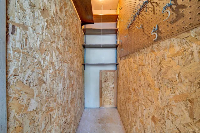 an aerial view of a house with a swimming pool