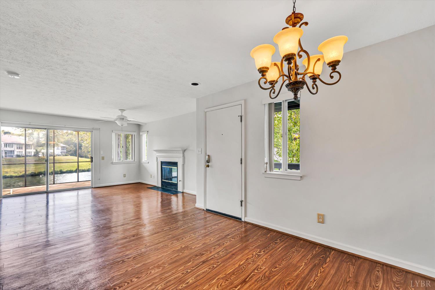 3114 Spinnaker Point Forest, VA 24551 - Photo 7 of 47 a view of a room with wooden floor and chandelier