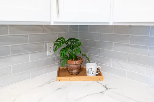 a floor plan in a room next to a window