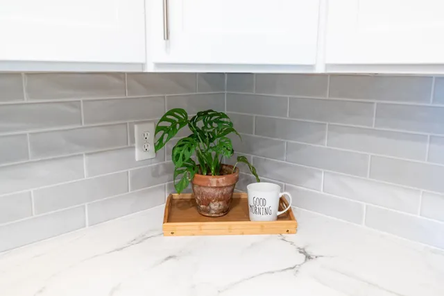 a floor plan in a room next to a window