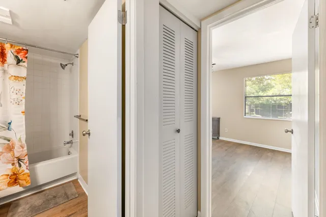 a view of bathroom with washer and dryer