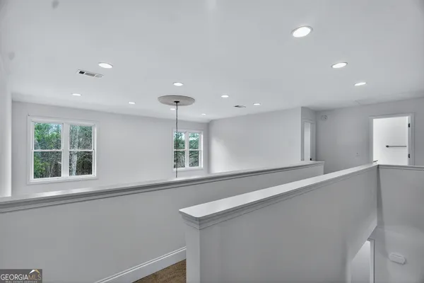 a bathroom with a shower and a toilet