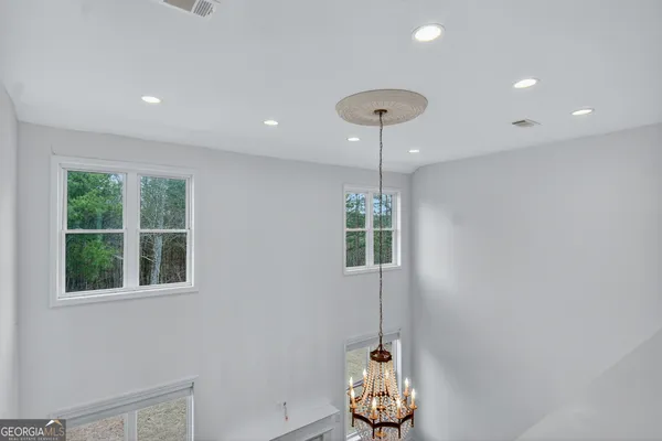 a view of a room that has a window in it