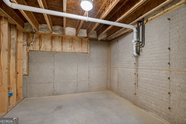 a front view of a building with a yard