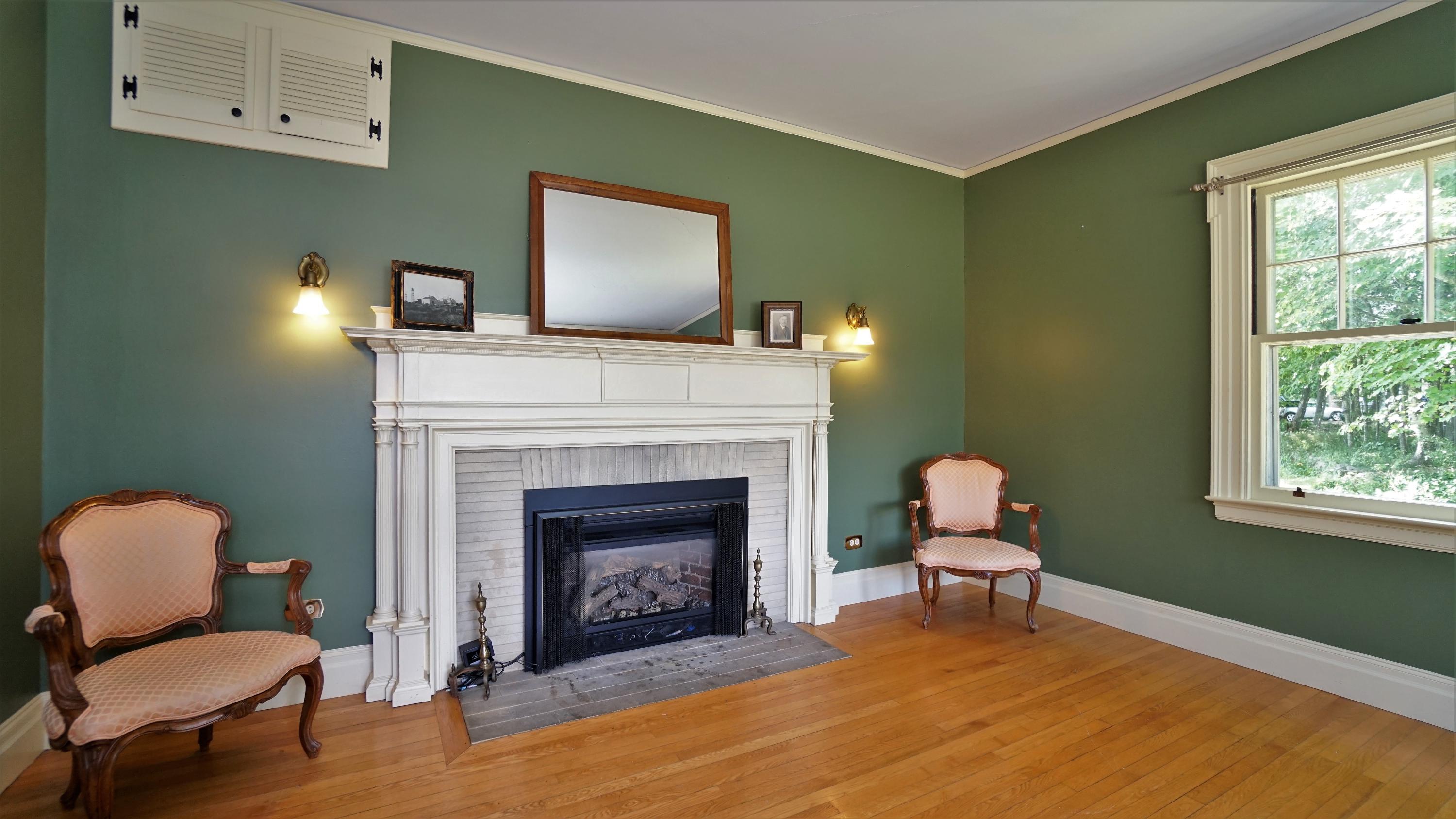 337 Intervale Road New Gloucester, ME 04260 - Photo 11 of 86 Parlor fireplace