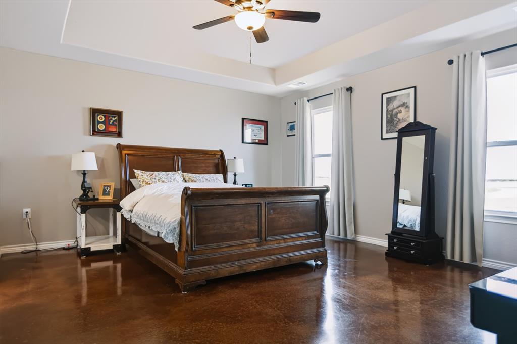 2433 Trlica Road West, TX 76691 - Photo 9 of 40 Tray ceiling with a ceiling fan
