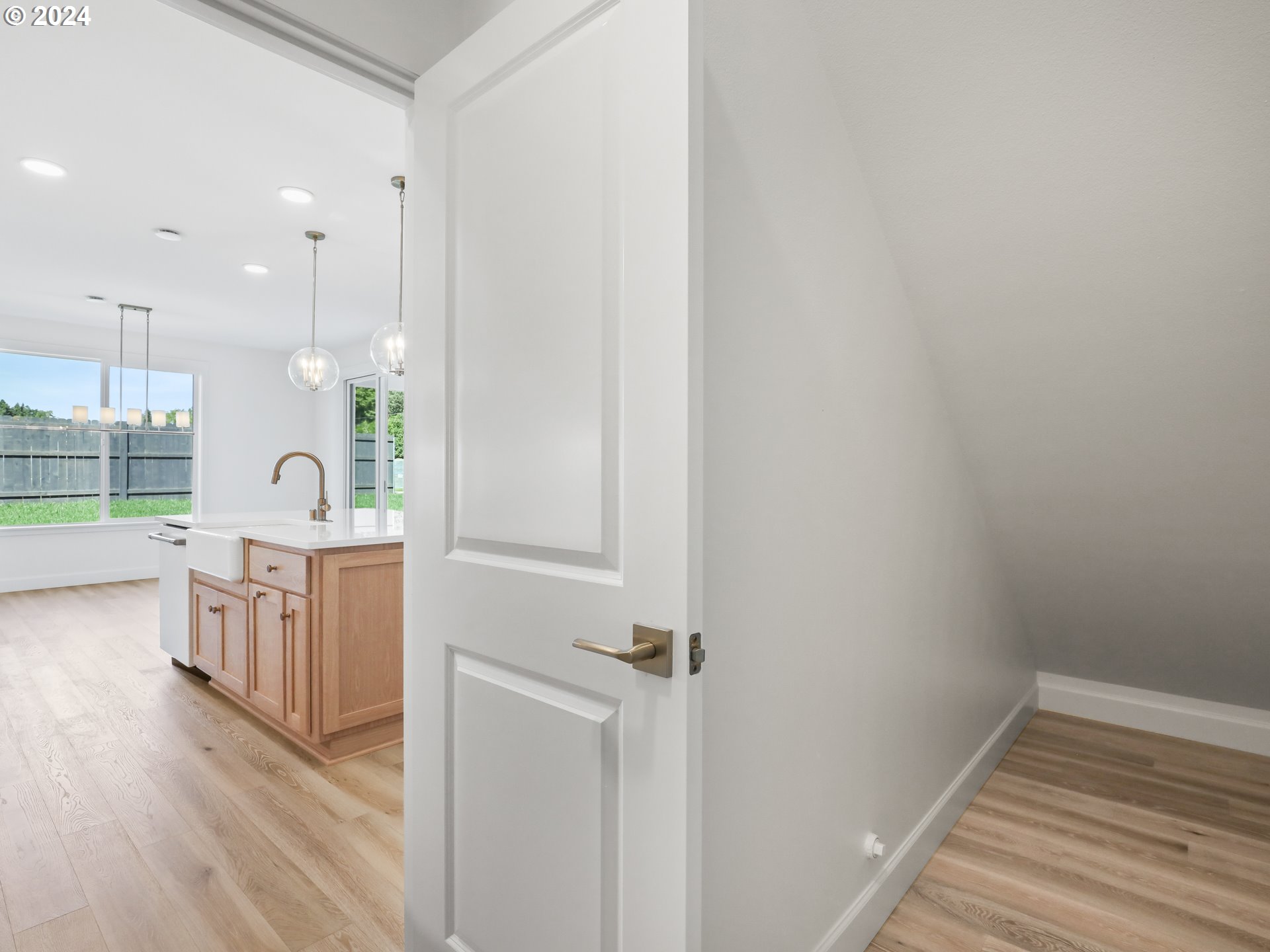 4400 North 12th Way Ridgefield, WA 98642 - Photo 20 of 31 a view of kitchen with wooden floor