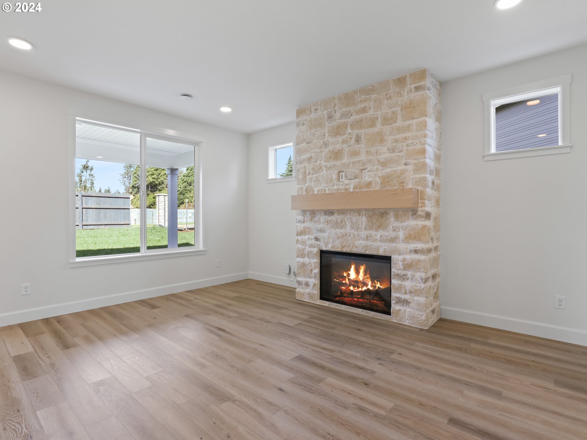 4400 North 12th Way Ridgefield, WA 98642 - Photo 5 of 31 a living room with furniture and a fireplace