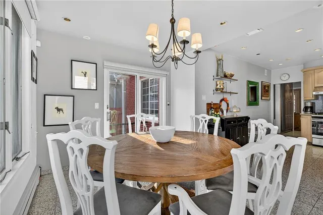 a bathroom with a double vanity sink a mirror and a