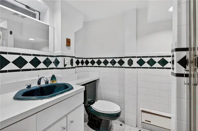 a store room with lots of different colored cloths