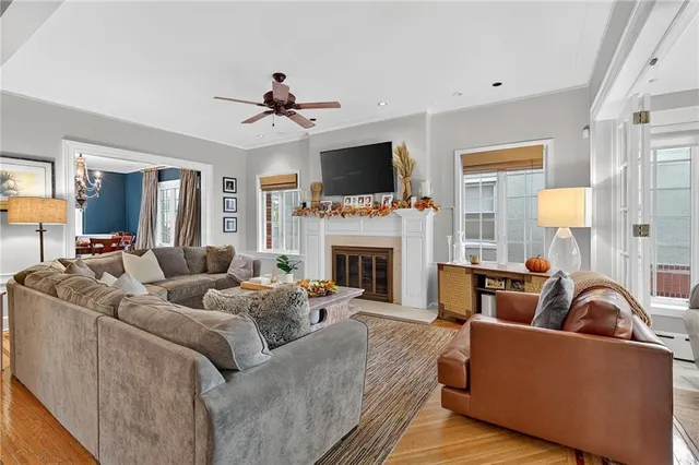 a living room with furniture and a rug