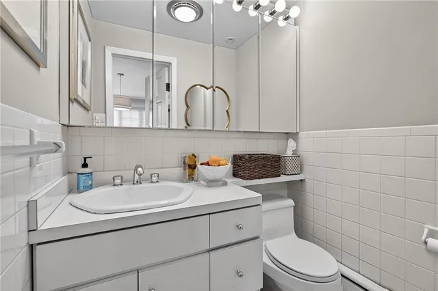 a view of a dining room with furniture and window