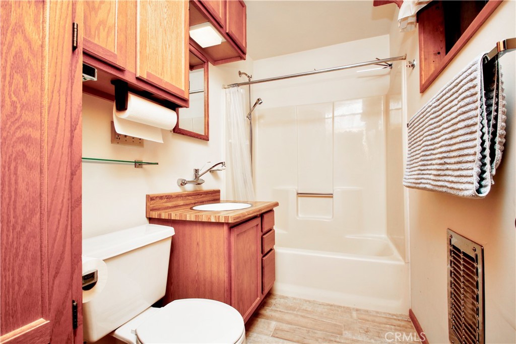 4650 Sizer Canyon Road Johnson Valley, CA 92285 - Photo 16 of 36 a bathroom with a sink a toilet and shower