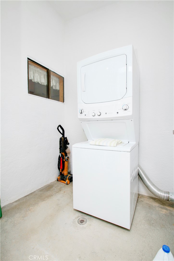 4650 Sizer Canyon Road Johnson Valley, CA 92285 - Photo 19 of 36 a utility room with dryer and washer