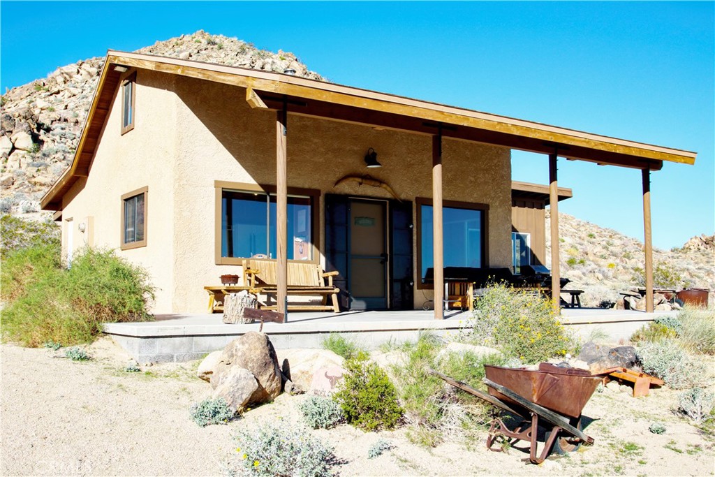 4650 Sizer Canyon Road Johnson Valley, CA 92285 - Photo 2 of 36 a view of a building with a patio