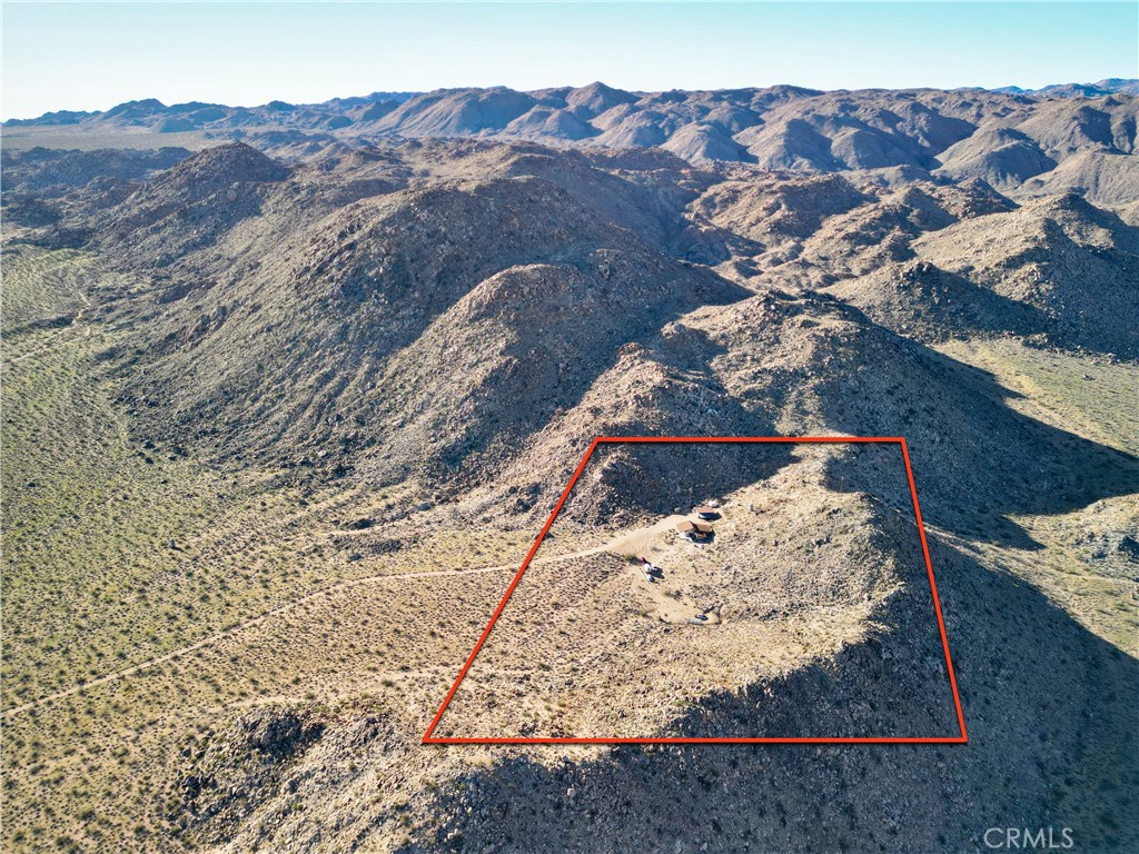 4650 Sizer Canyon Road Johnson Valley, CA 92285 - Photo 29 of 36 a view of a wooden floor with a mountain