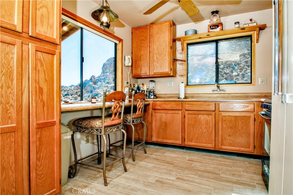 4650 Sizer Canyon Road Johnson Valley, CA 92285 - Photo 6 of 36 a dining room filled with furniture and window