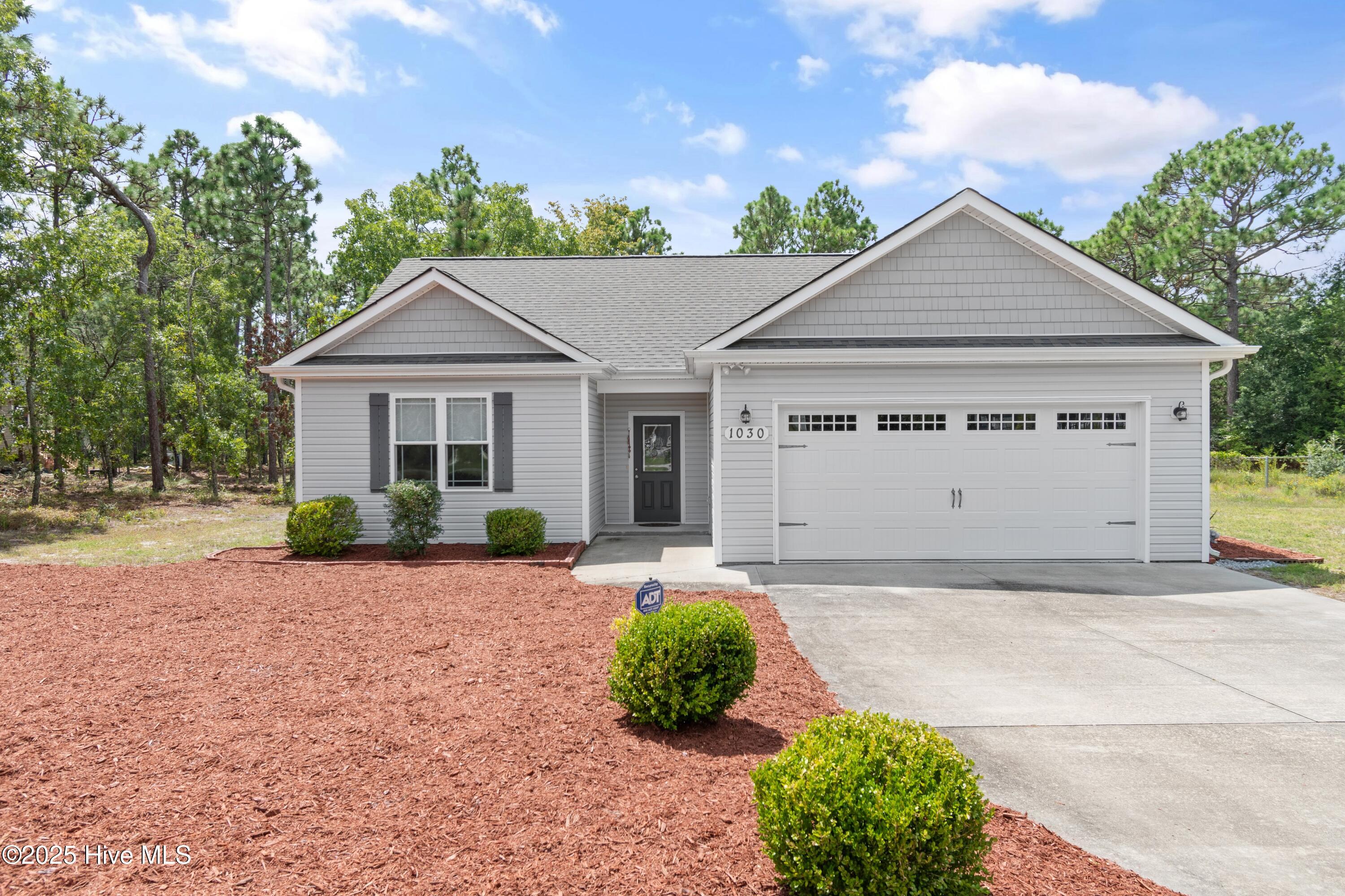1030 Fillmore Road Southport, NC 28461 - Photo 1 of 38 front view