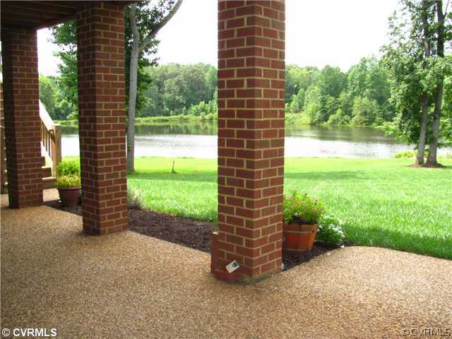 1384 Palmore Road Powhatan, VA 23139 - Photo 21 of 24 Patio/Deck - Patio with view of the lake
