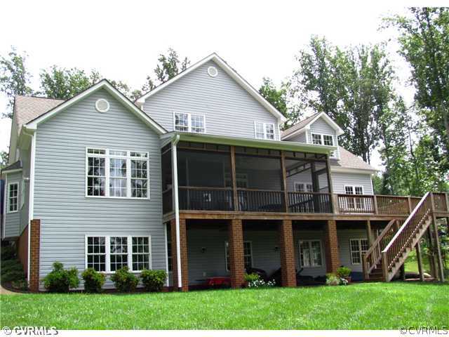 1384 Palmore Road Powhatan, VA 23139 - Photo 3 of 24 Patio/Deck - View of the back of the house shows t