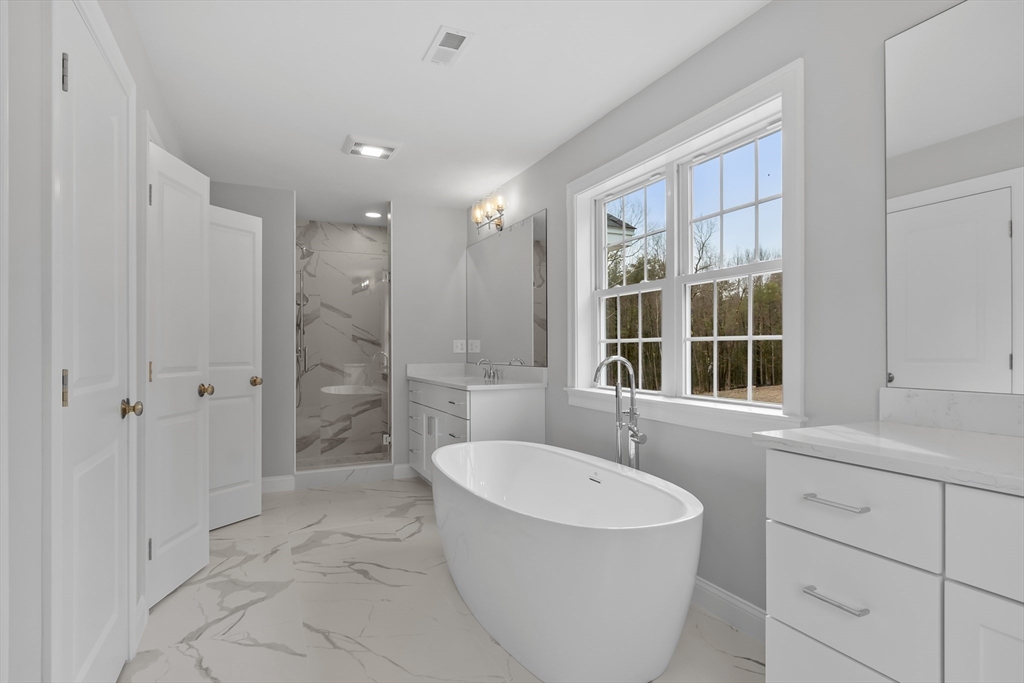 20 Rawson Farm Road Mendon, MA 01756 - Photo 20 of 35 a bathroom with a bathtub and a sink