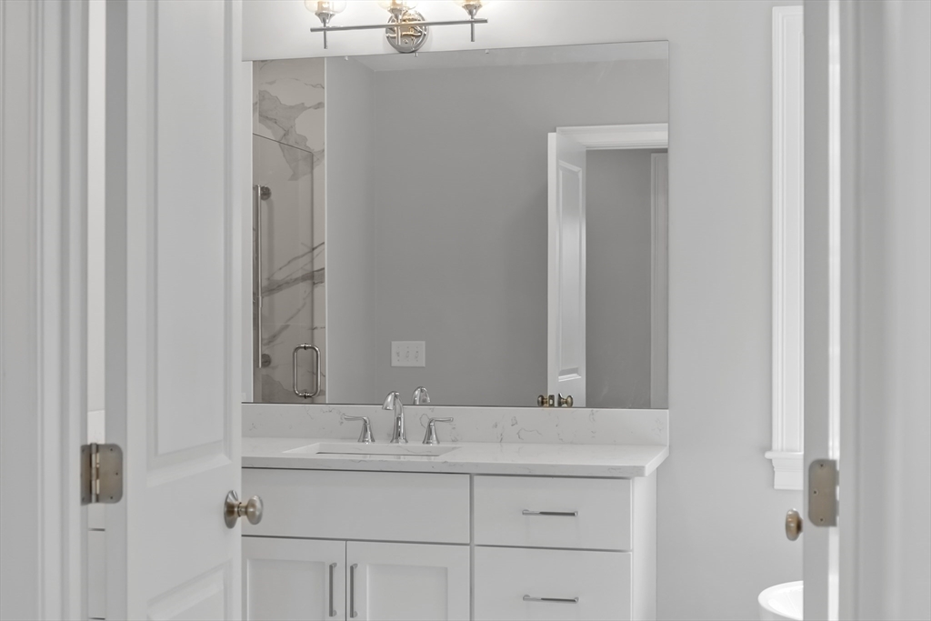 20 Rawson Farm Road Mendon, MA 01756 - Photo 23 of 35 a bathroom with a sink and a mirror